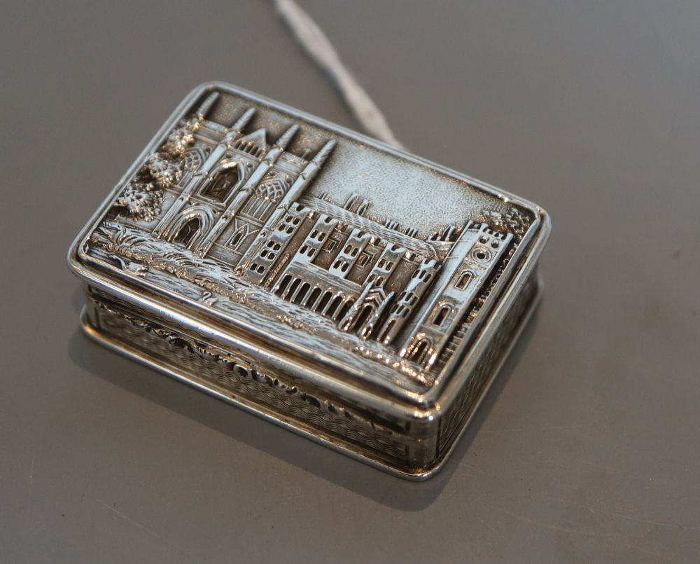 A George IV silver castle top vinaigrette by Nathaniel Mills, depicting Newstead Abbey, London, 1827, 38mm.